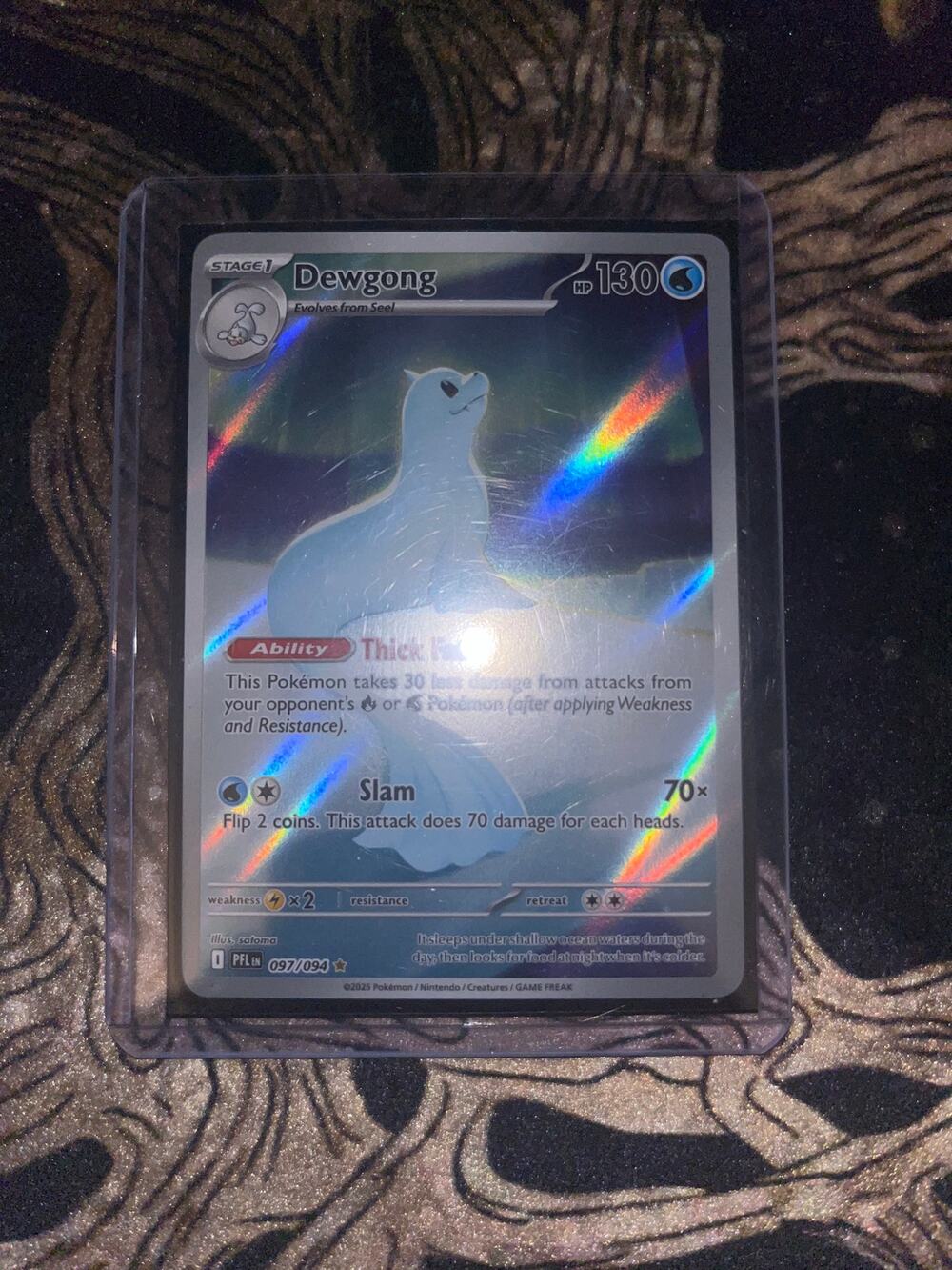 Dewgong Pokémon card (#097/094) from the Phantasmal Flames set.